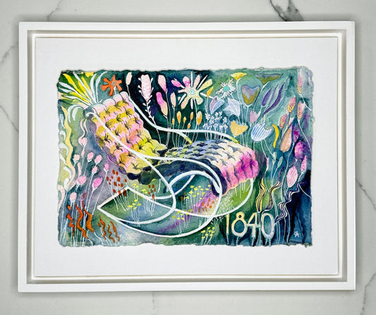 Framed colorful abstract artwork of a comfortable tufted rocking chair from 1840 with florals surrounding it in a magical garden scene on a marble surface